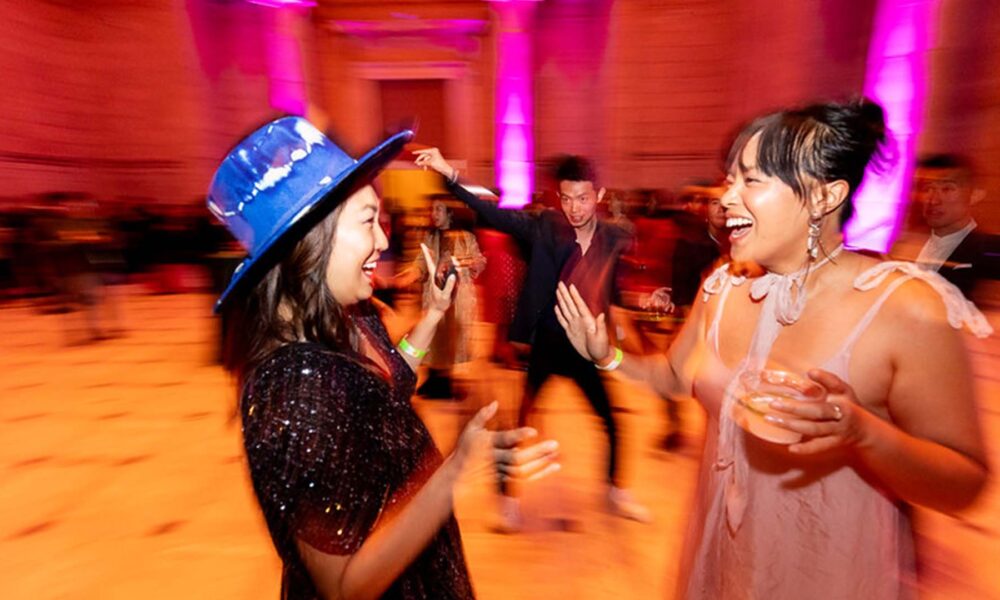 two asian women laughing