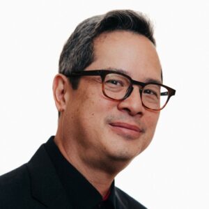 headshot of man with glasses